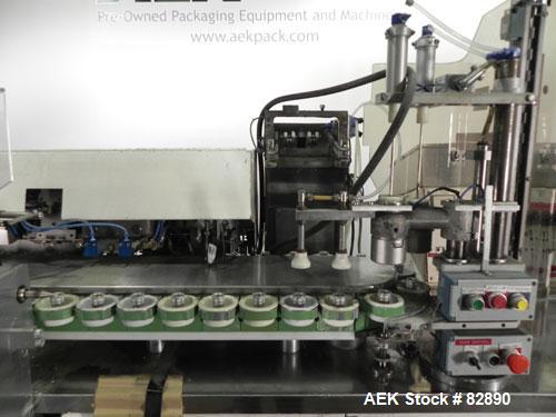 Used Arenco Model AM2000 Twin Piston Laminate Tube Filler. Currently equipped with high frequency sealer. Tubes are fed automatically through a dual tube magazine. Stations include tube cleaning, tub...
