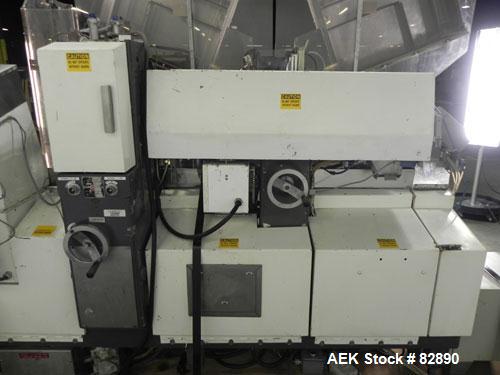 Used Arenco Model AM2000 Twin Piston Laminate Tube Filler. Currently equipped with high frequency sealer. Tubes are fed automatically through a dual tube magazine. Stations include tube cleaning, tub...