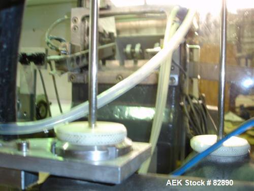 Used Arenco Model AM2000 Twin Piston Laminate Tube Filler. Currently equipped with high frequency sealer. Tubes are fed automatically through a dual tube magazine. Stations include tube cleaning, tub...