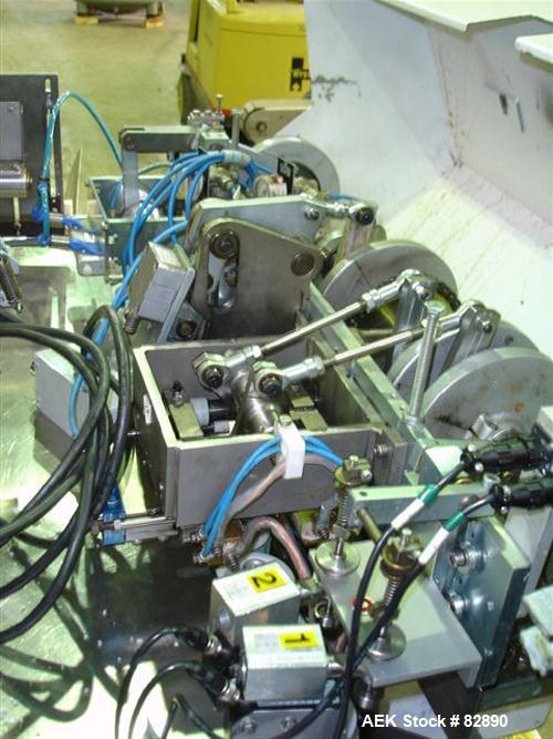 Used Arenco Model AM2000 Twin Piston Laminate Tube Filler. Currently equipped with high frequency sealer. Tubes are fed automatically through a dual tube magazine. Stations include tube cleaning, tub...