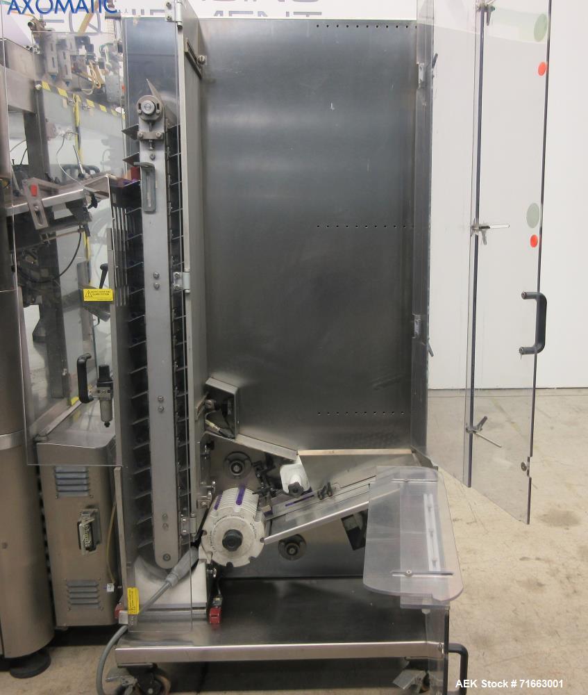 Used- Axomatic Automatic Hot Air Multi-Color Plastic Tube Filler