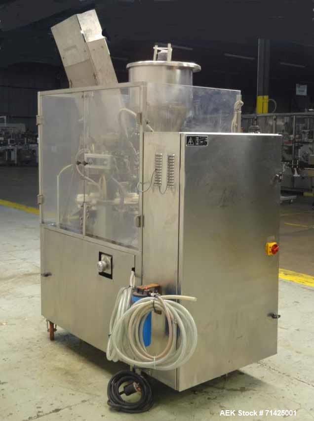 Used- Comadis Model C130 Rotary Plastic Tube Filler