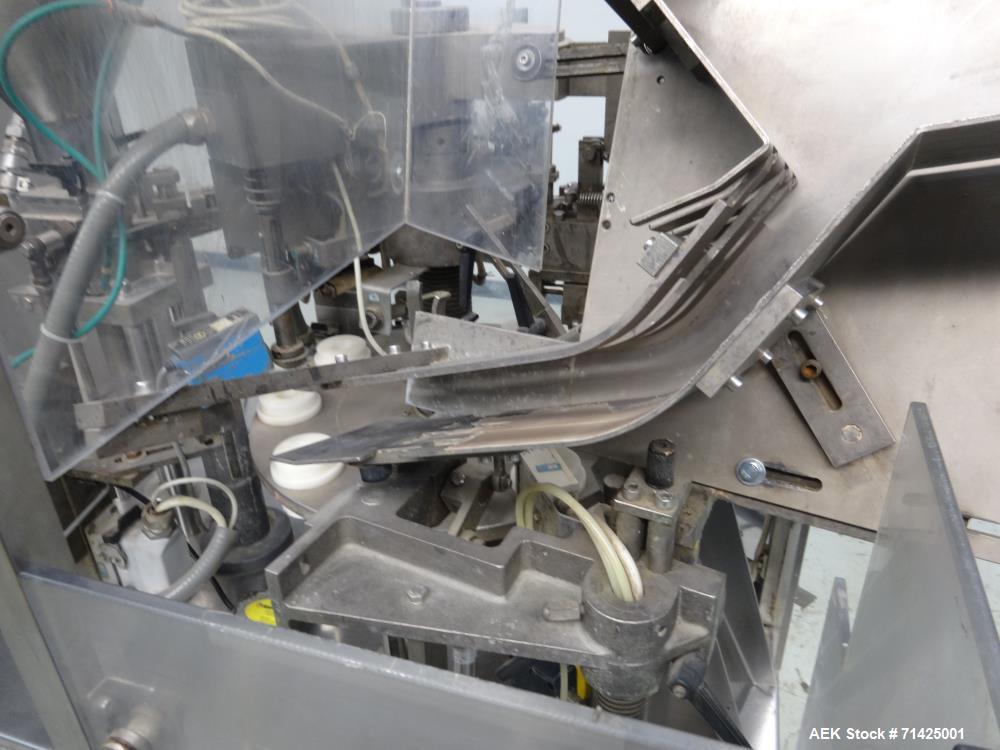 Used Comadis Model C130 Rotary Plastic Tube Filler
