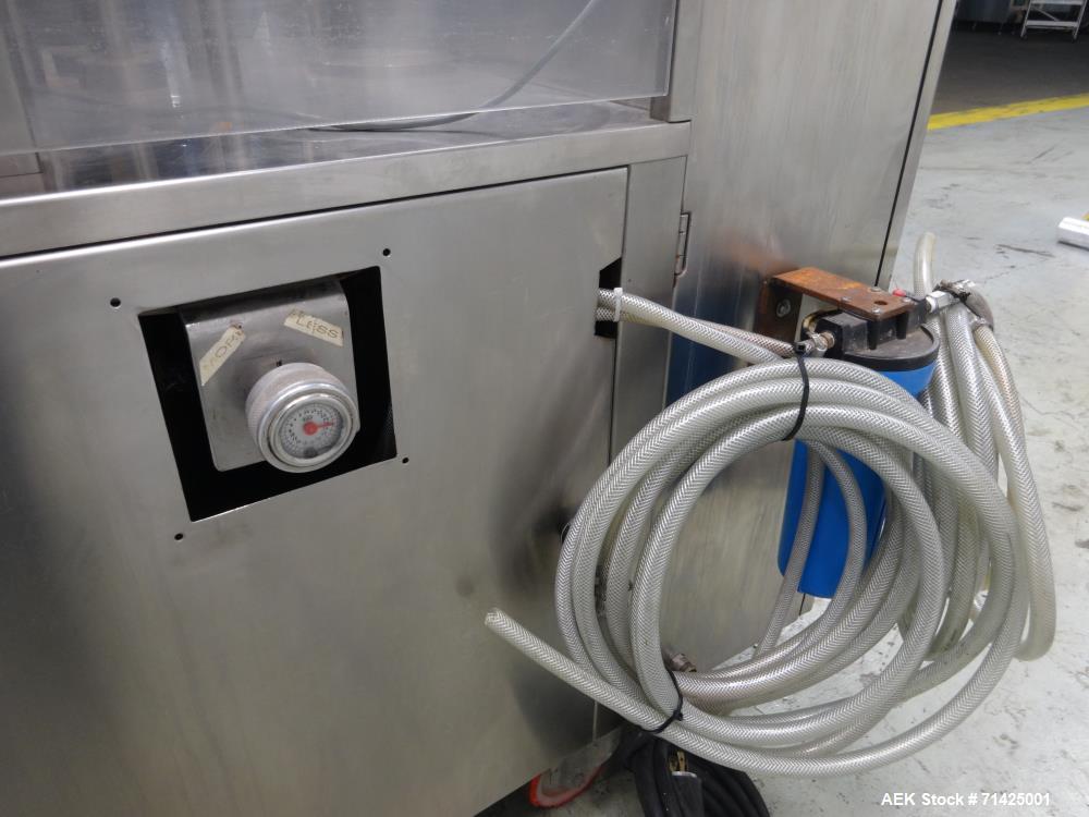 Used Comadis Model C130 Rotary Plastic Tube Filler
