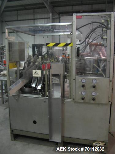 Used IWKA Plastic/Laminate Tube Filler, Model TU 200. IWKA TZ101 automatic tube feeder; speeds of up to 250 tubes per minute. Stainless steel product feed hopper. Tube registration station. Dual fill...