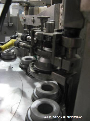 Used IWKA Plastic/Laminate Tube Filler, Model TU 200. IWKA TZ101 automatic tube feeder; speeds of up to 250 tubes per minute. Stainless steel product feed hopper. Tube registration station. Dual fill...