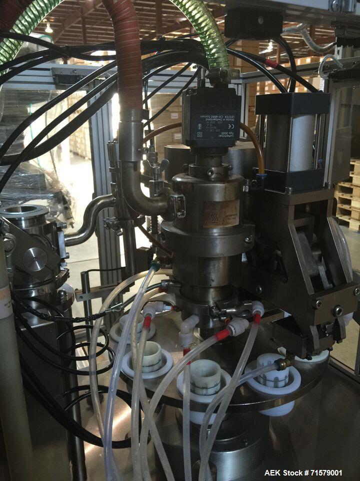 Used JDA Plastic Tube Filler, Model Super 30. 2,400 tubes per hour, tubes have diameters of: 1 Set: 36.5mm in diameter and 73mm tall.  Leister Hot Air Tube sealer, CH-6060 Sarnen, 220  230 V. Water C...
