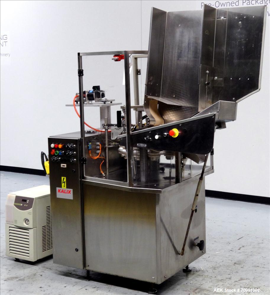Used Kalix Model KX-600E automatic hot air plastic tube filler