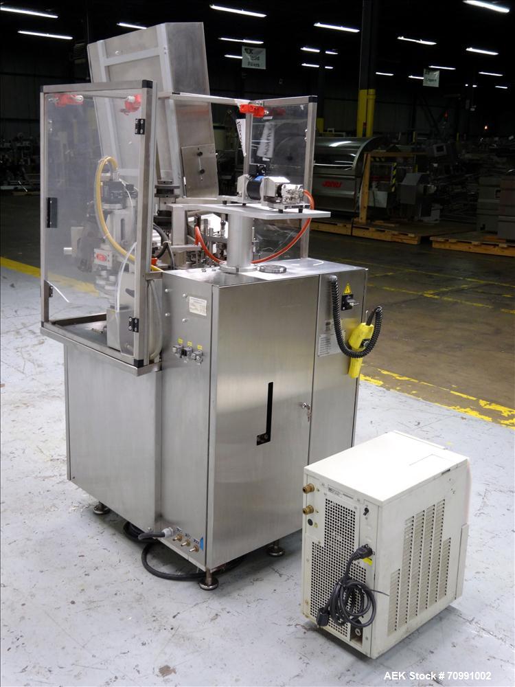 Used Kalix Model KX-600E automatic hot air plastic tube filler