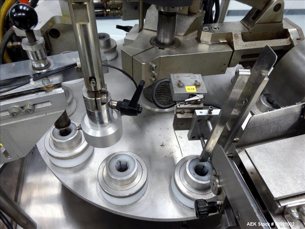 Used Kalix Model KX-600E automatic hot air plastic tube filler