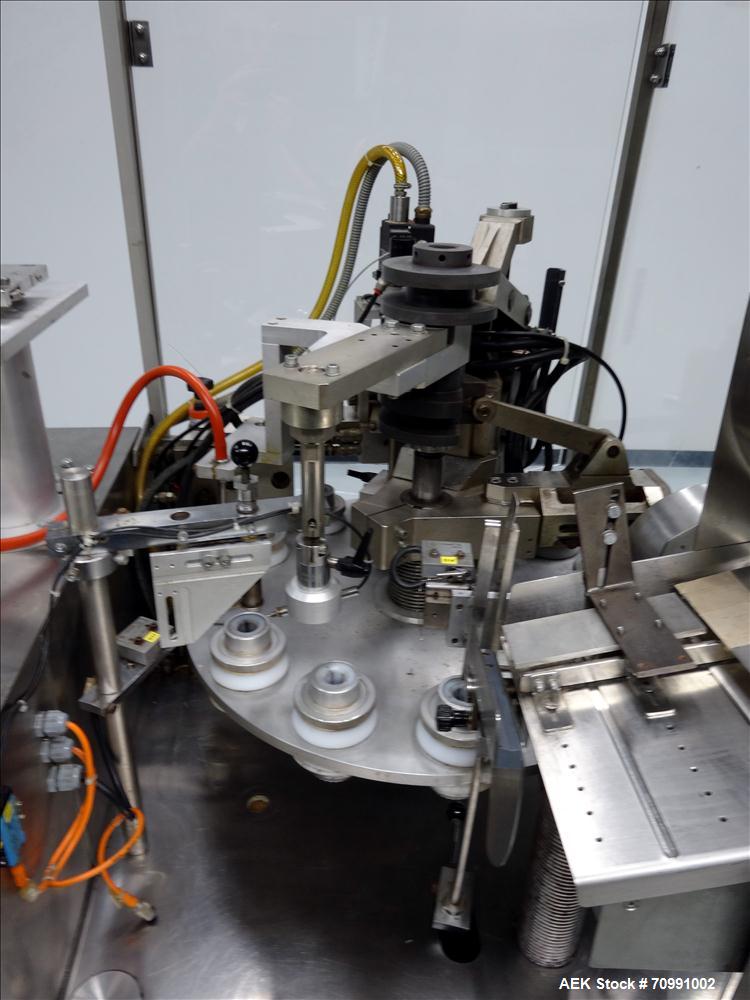 Used Kalix Model KX-600E automatic hot air plastic tube filler