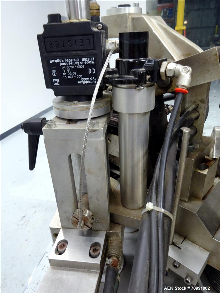 Used Kalix Model KX-600E automatic hot air plastic tube filler