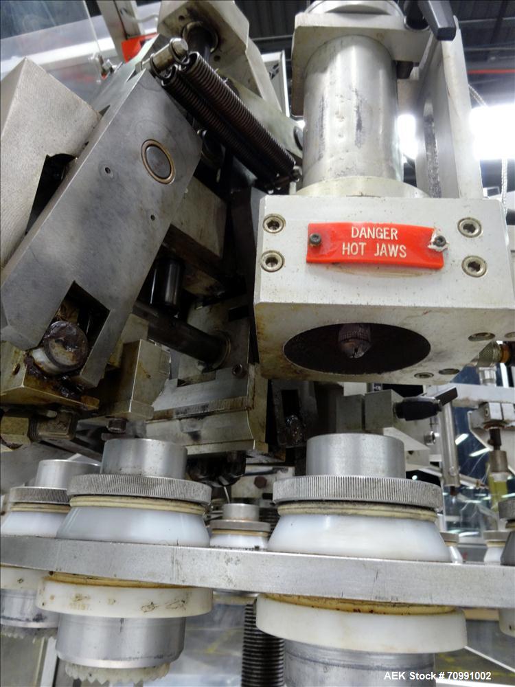 Used Kalix Model KX-600E automatic hot air plastic tube filler
