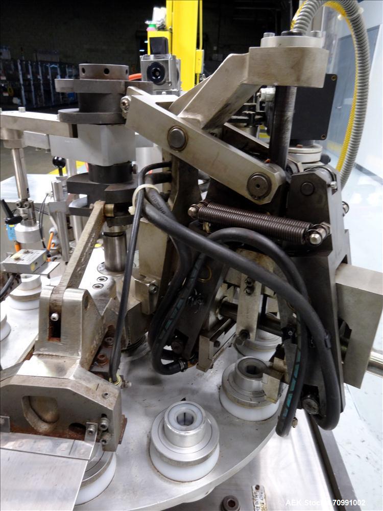 Used Kalix Model KX-600E automatic hot air plastic tube filler