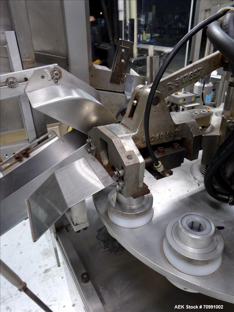 Used Kalix Model KX-600E automatic hot air plastic tube filler