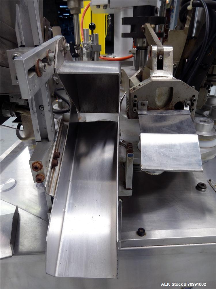 Used Kalix Model KX-600E automatic hot air plastic tube filler