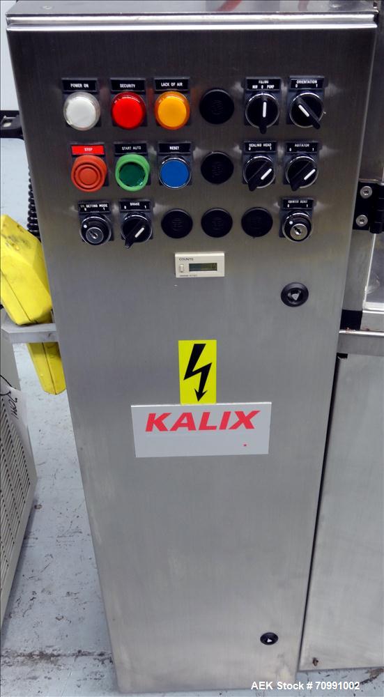 Used Kalix Model KX-600E automatic hot air plastic tube filler