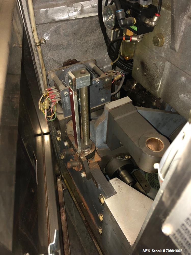 Used Kalix Model KX-600E automatic hot air plastic tube filler