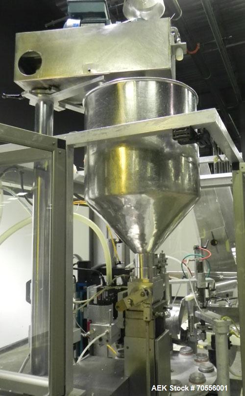 Used Klenz Pak Model KX80B 12 Station Hot Air Plastic Tube Filler. Machine is capable of speeds up to 80 tubes per minute. Tube size range: diameter up to 2" or 50mm, height up to 8" or 200mm. Fill s...