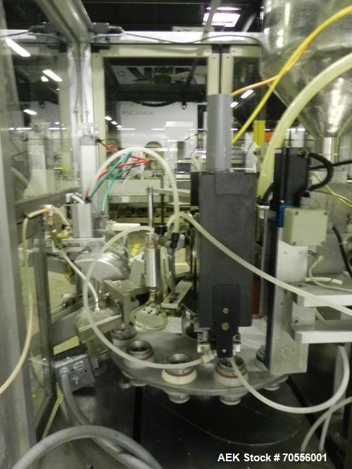 Used Klenz Pak Model KX80B 12 Station Hot Air Plastic Tube Filler. Machine is capable of speeds up to 80 tubes per minute. Tube size range: diameter up to 2" or 50mm, height up to 8" or 200mm. Fill s...