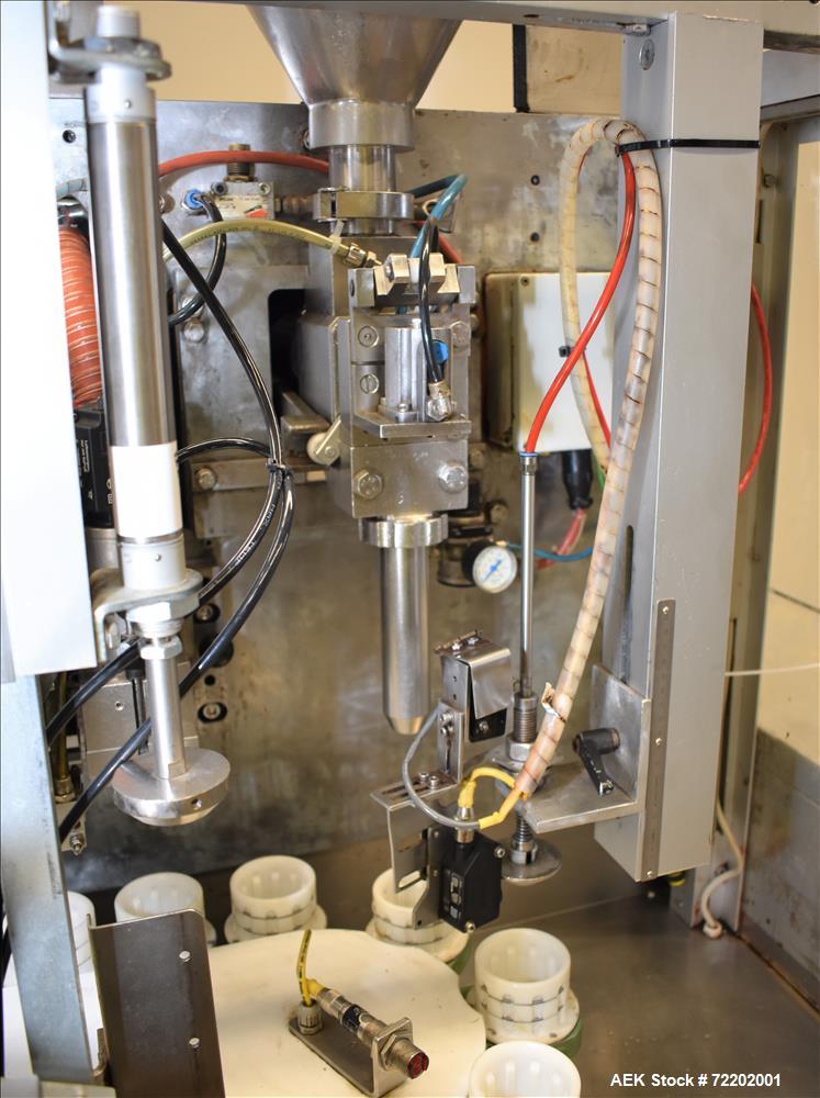 Used Norden NM-400 Plastic Tube Filler and Sealer.