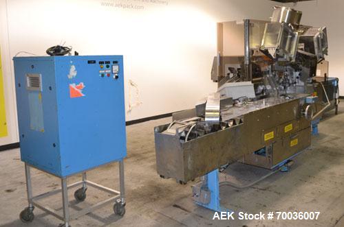 Used Norden Dual Head High Speed Tube Filler, Model NM 2000 HF for laminate tubes. Capable of 200 tubes per minute. Includes tube cleaning, cassette tube infeed, registration, and trimmer. Fill volum...