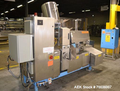 Used Norden Dual Head High Speed Tube Filler, Model NM 2000 HF for laminate tubes. Capable of 200 tubes per minute. Includes tube cleaning, cassette tube infeed, registration, and trimmer. Fill volum...