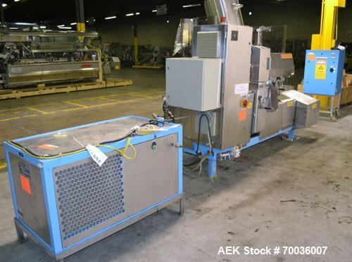 Used Norden Dual Head High Speed Tube Filler, Model NM 2000 HF for laminate tubes. Capable of 200 tubes per minute. Includes tube cleaning, cassette tube infeed, registration, and trimmer. Fill volum...