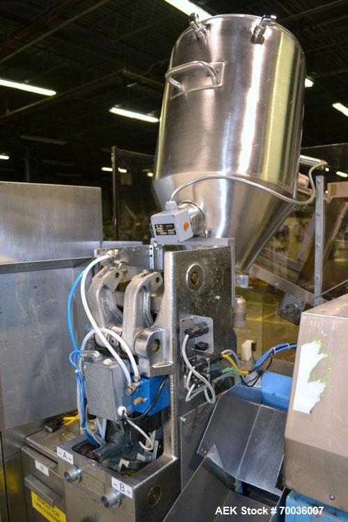 Used Norden Dual Head High Speed Tube Filler, Model NM 2000 HF for laminate tubes. Capable of 200 tubes per minute. Includes tube cleaning, cassette tube infeed, registration, and trimmer. Fill volum...