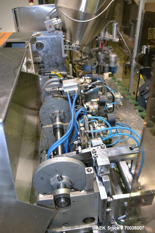Used Norden Dual Head High Speed Tube Filler, Model NM 2000 HF for laminate tubes. Capable of 200 tubes per minute. Includes tube cleaning, cassette tube infeed, registration, and trimmer. Fill volum...