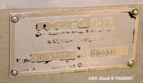 Used Norden Dual Head High Speed Tube Filler, Model NM 2000 HF for laminate tubes. Capable of 200 tubes per minute. Includes tube cleaning, cassette tube infeed, registration, and trimmer. Fill volum...