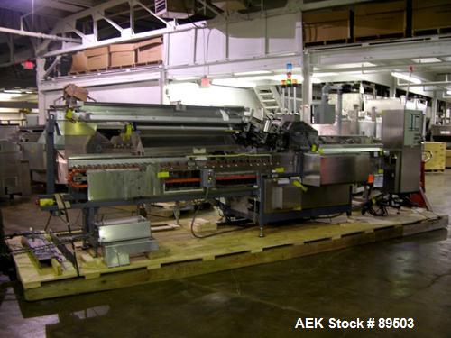 Used Norden Plastic Tube Filling Line Consisting Of: (1) Model NM2000 Norden tube filler, hinged cassette tube feeder, tube cleaning, vision system, cap torquing, twin head bottom up piston fill stat...