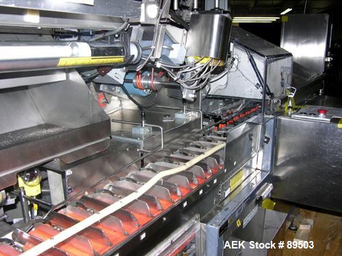 Used Norden Plastic Tube Filling Line Consisting Of: (1) Model NM2000 Norden tube filler, hinged cassette tube feeder, tube cleaning, vision system, cap torquing, twin head bottom up piston fill stat...