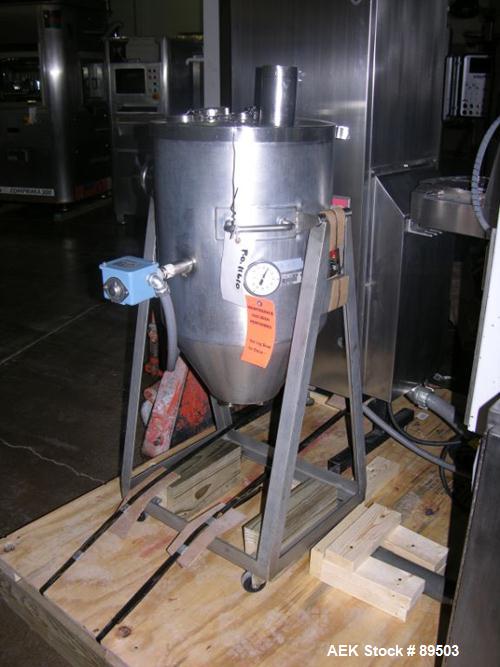 Used Norden Plastic Tube Filling Line Consisting Of: (1) Model NM2000 Norden tube filler, hinged cassette tube feeder, tube cleaning, vision system, cap torquing, twin head bottom up piston fill stat...