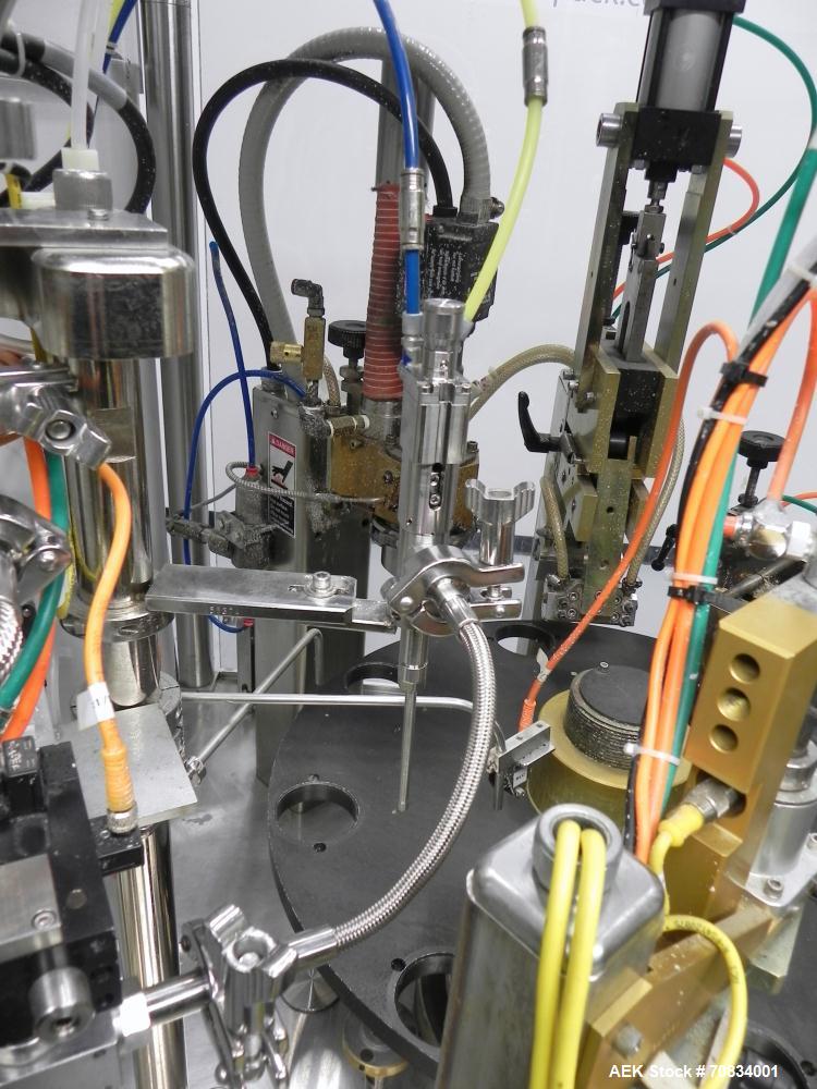 Used Prosys Model RT60H Hibar Pump Hot Air Plastic Tube Filler. Single pump servo driven rotary filler for micro-dose applications. Rated at speeds up to 70 tubes per minute. Has a fill volume range ...