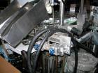 Used Arenco Model AM2000 Twin Piston Laminate Tube Filler. Currently equipped with high frequency sealer. Tubes are fed automatically through a dual tube magazine. Stations include tube cleaning, tub...