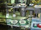 Used Arenco Model AM2000 Twin Piston Laminate Tube Filler. Currently equipped with high frequency sealer. Tubes are fed automatically through a dual tube magazine. Stations include tube cleaning, tub...