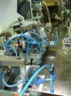 Used Arenco Model AM2000 Twin Piston Laminate Tube Filler. Currently equipped with high frequency sealer. Tubes are fed automatically through a dual tube magazine. Stations include tube cleaning, tub...
