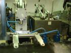 Used Arenco Model AM2000 Twin Piston Laminate Tube Filler. Currently equipped with high frequency sealer. Tubes are fed automatically through a dual tube magazine. Stations include tube cleaning, tub...