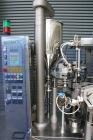 Used Axiomatic Model Optima 700 Axomatic Tube Filler. 7 Station, water cooled hot jaws, hopper with agitator, maximum speed of 2,500 pieces/hour, automatic tube positioning, fixed nozzle with bush-ra...