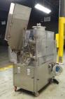 Used- Comadis Model C130 Rotary Plastic Tube Filler