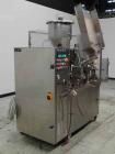 Used- Comadis Model C130 Rotary Plastic Tube Filler