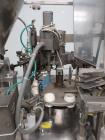 Used Comadis Model C130 Rotary Plastic Tube Filler