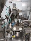 Used- Comadis Model C130 Rotary Plastic Tube Filler