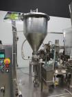 Used- Comadis Model C130 Rotary Plastic Tube Filler