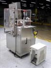 Used Kalix Model KX-600E automatic hot air plastic tube filler