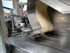 Used Kalix Model KX-600E automatic hot air plastic tube filler