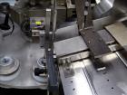 Used Kalix Model KX-600E automatic hot air plastic tube filler