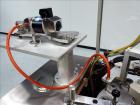 Used Kalix Model KX-600E automatic hot air plastic tube filler