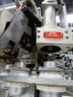 Used Kalix Model KX-600E automatic hot air plastic tube filler
